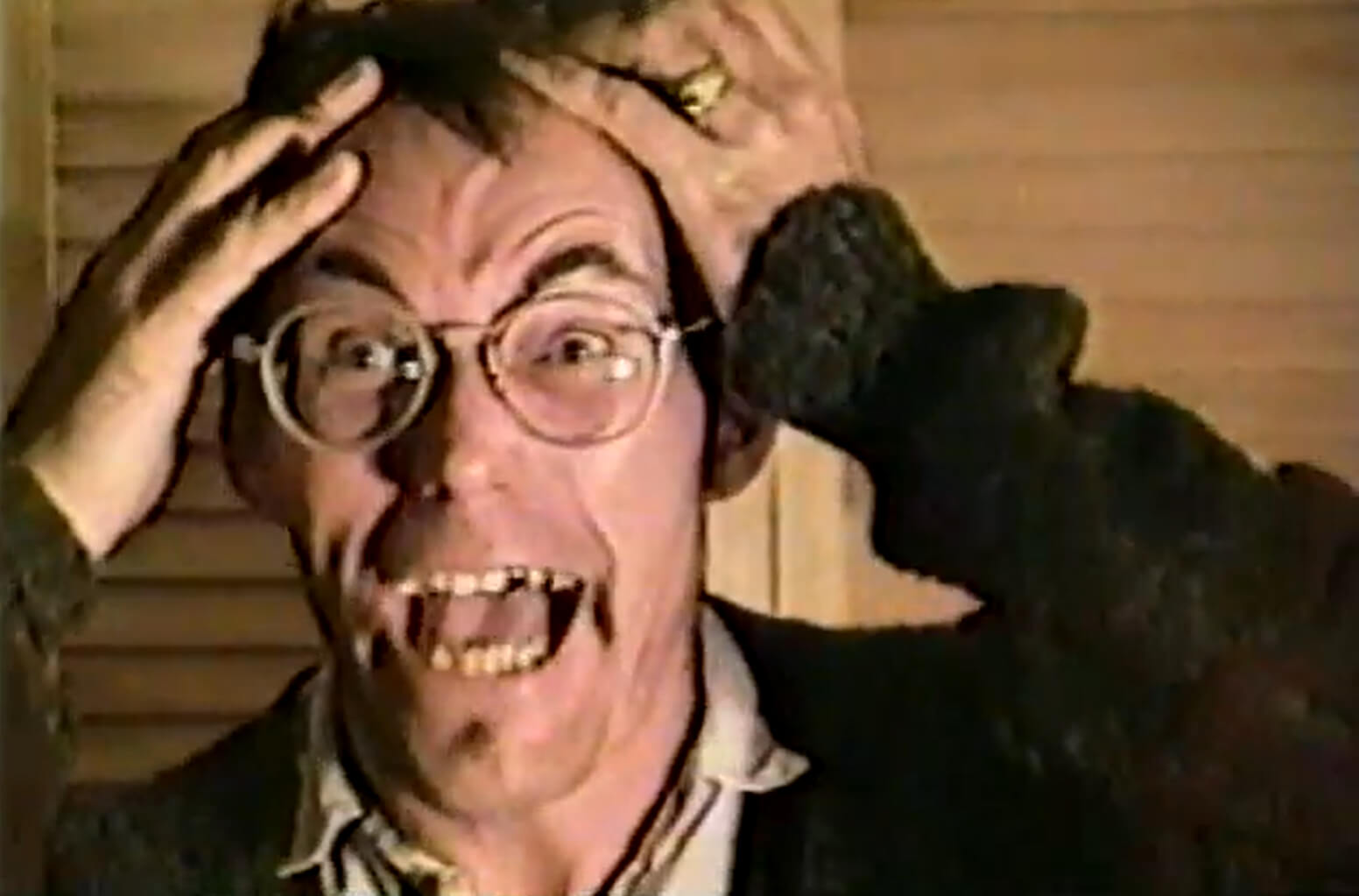 Charles Gocher performing 'An Old Eyeball In a Quart Jar of Snot' in the 1994 video 'Cloaven Theater'